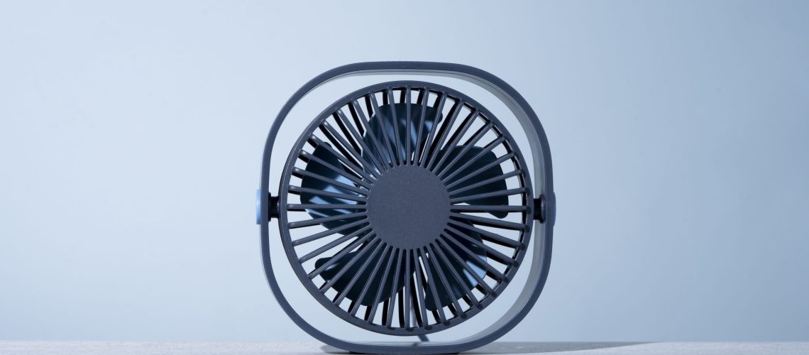 modern-round-desk-fan-with-simple-background